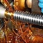 Engrenages machine avec fluide de travail des métaux soluble et polyvalent
