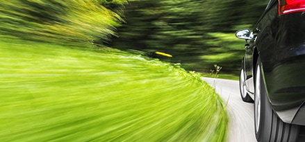 black car on road