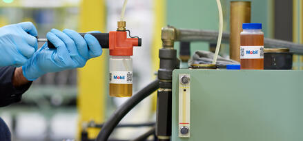 Mobil engineer a sample for Mobil Lubricant Analysis