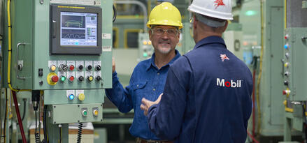 Mobil services engineers talking