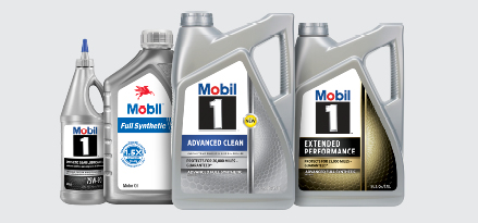 The image shows four bottles standing next to each other, the first one is of Mobil 1 Synthetic gear lubricant, second one of Mobil Full Synthetic, third Mobil 1 Advanced Clean, and the last one of Mobil 1 Extended Performance