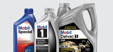 The image shows a line up of three Mobil and Mobil 1 lubricants. The first is a bottle of Mobil Special, the second of Mobil 1 and the third one of Mobil Delvac 1 ESP